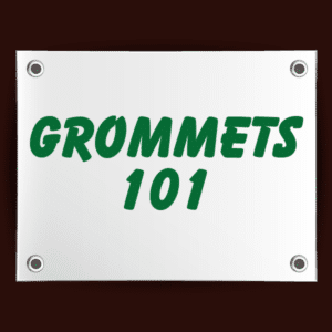 Photo of a white sign with grommets, sign says grommets 101